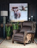 The Bronco Brindleback Recliner: A masterfully crafted, American-made recliner with a grand scale, bustle back, and supple light brown leather. Upholstery-grade brindle cowhide and gold-colored nail tacks add a touch of Western charm. Experience ultimate