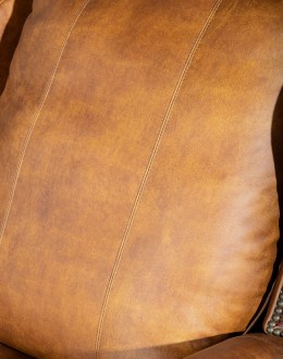 distressed tan leather wingback recliner