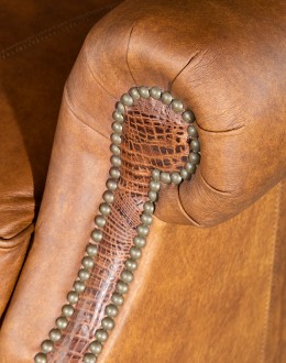 distressed tan leather wingback recliner