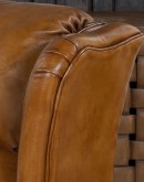 large bustle back recliner with saddle tan leather