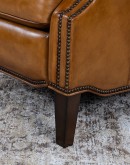 large bustle back recliner with saddle tan leather