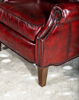 vibrant dark red leather recliner