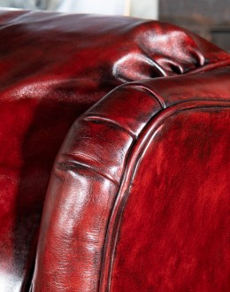 vibrant dark red leather recliner