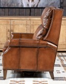 Brown Leather Recliner with full-grain leather, hand-burnished details, brass nail tacks, and bustle back design for optimal comfort.