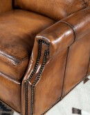 Brown Leather Recliner with full-grain leather, hand-burnished details, brass nail tacks, and bustle back design for optimal comfort.