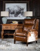 brown saddle recliner with speckled cowhide accents