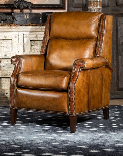 tan saddle leather recliner with bustle back