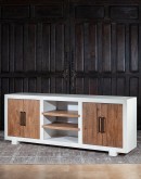 A TX Blanco Media Console with a two-tone finish, combining Avalanche White and Vintage Natural over rustic Hickory wood. Features include four doors with dark brushed bronze bar pulls, adjustable shelves, and a ventilated back panel.