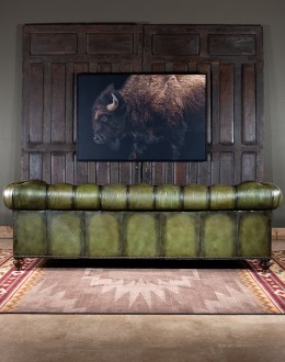 American-made Berkshire Olive Chesterfield Sofa with hand burnished full-grain leather and brass nail tacks detailing, showcasing traditional craftsmanship.