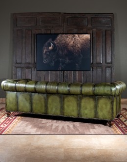 American-made Berkshire Olive Chesterfield Sofa with hand burnished full-grain leather and brass nail tacks detailing, showcasing traditional craftsmanship.