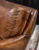 The Cowboy AF Leather Sofa is a western-style armchair with a luxurious full-grain leather finish