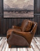 The Cowboy AF Leather Sofa is a western-style armchair with a luxurious full-grain leather finish