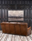 The Cowboy AF Leather Sofa is a western-style armchair with a luxurious full-grain leather finish