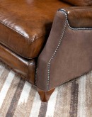 The Cowboy AF Leather Sofa is a western-style armchair with a luxurious full-grain leather finish