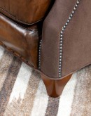 The Cowboy AF Leather Sofa is a western-style armchair with a luxurious full-grain leather finish