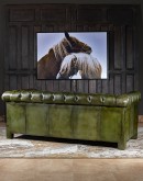 Ivy League Leather Sofa - Modernized Chesterfield style sofa in olive green full grain leather with hand burnished accents, deep button tufts, and brass nail tack trimmings. Experience luxury and timeless elegance