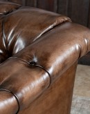 Lockwood Smoked Chesterfield Sofa in bronzed chocolate brown full-grain leather with button tufting, brass nail tacks, and handcrafted detailing