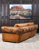 Mountain Mesa Leather Sofa featuring hand-painted mountain landscape, full-grain leather upholstery, and stitched front arm panels, part of Adobe Interiors' Mountain Ranch Collection.