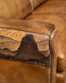 Mountain Mesa Leather Sofa featuring hand-painted mountain landscape, full-grain leather upholstery, and stitched front arm panels, part of Adobe Interiors' Mountain Ranch Collection.