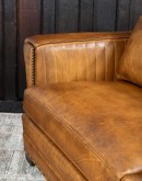 Mountain Mesa Leather Sofa featuring hand-painted mountain landscape, full-grain leather upholstery, and stitched front arm panels, part of Adobe Interiors' Mountain Ranch Collection.