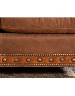 distressed brown leather sofa