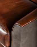 Luxurious Argonaut Leather Sofa with full-grain and Nubuck leather, brass nail tacks, and traditional craftsmanship details, seating four comfortably