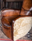 vintage leather swivel chair with white shearling hair on outsides