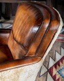 vintage leather swivel chair with white shearling hair on outsides