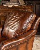 leather chair with a boot stitch design on seat back