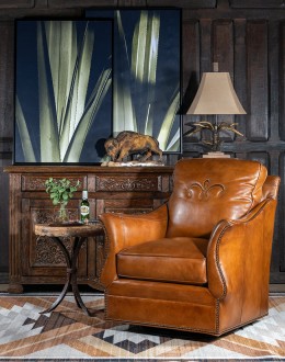 Durango Swivel Glider swivel glider chair with light brown saddle leather,