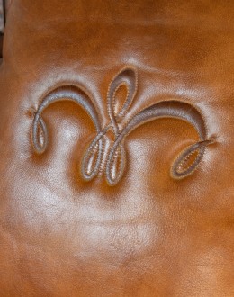 Durango Swivel Glider swivel glider chair with light brown saddle leather,