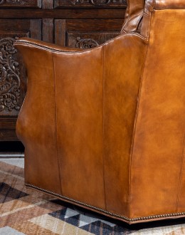 Durango Swivel Glider swivel glider chair with light brown saddle leather,