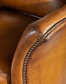 Durango Swivel Glider swivel glider chair with light brown saddle leather,