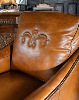 Durango Swivel Glider swivel glider chair with light brown saddle leather,