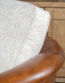 Ella Bark Swivel Chair featuring a blend of hand-burnished leather and light tweed fabric upholstery, showcasing a sleek design with a hardwood frame and swivel mechanism.