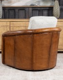 Ella Bark Swivel Chair featuring a blend of hand-burnished leather and light tweed fabric upholstery, showcasing a sleek design with a hardwood frame and swivel mechanism.