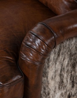 dakota swivel chair,swivel glider chair with saddle leather and brindle cowhide on outside