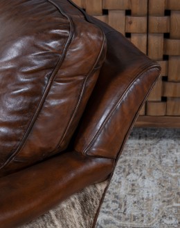 dakota swivel chair,swivel glider chair with saddle leather and brindle cowhide on outside