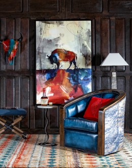 Huckleberry Swivel Chair barrel swivel chair with dark blue leather and cowhide on the outside