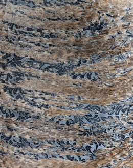 Huckleberry Swivel Chair barrel swivel chair with dark blue leather and cowhide on the outside