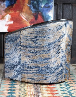 Huckleberry Swivel Chair barrel swivel chair with dark blue leather and cowhide on the outside