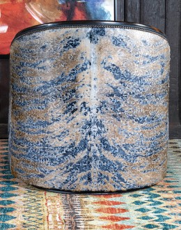 Huckleberry Swivel Chair barrel swivel chair with dark blue leather and cowhide on the outside