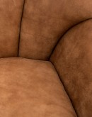 tan distressed leather swivel and glider chair