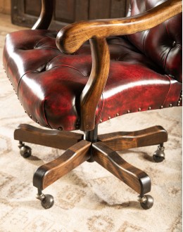 desk chair with dark red tufted leather