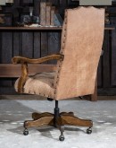 desk chair with distressed tan tufted leather
