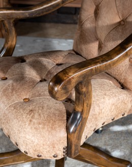 desk chair with distressed tan tufted leather
