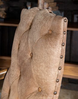 desk chair with distressed tan tufted leather