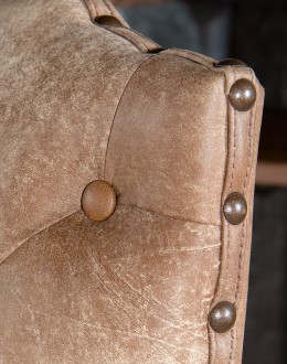 desk chair with distressed tan tufted leather