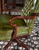 elegant office chair in olive green leather with button tufts