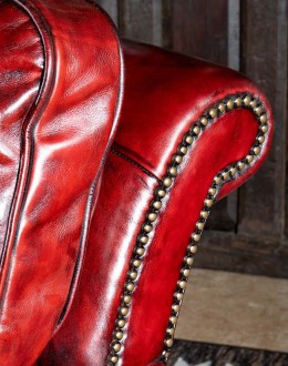 small dark red leather sofa